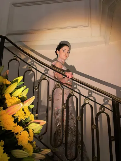 An artistic shot of a bride in a pastel gown, creating a timeless and elegant portrait.