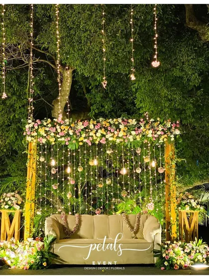 Another angle of the dreamy Jayamala decor, showcasing the intricate details and the romantic ambiance created by the combination of flowers and lights.