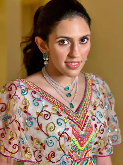 A close-up of the colorful embroidered blouse from the Abu Jani Sandeep Khosla lehenga. The craftsmanship is just incredible.