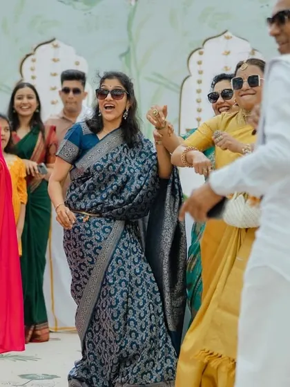 Leading a musical game with the ladies. The smiles and dancing say everything about the vibe of the event.