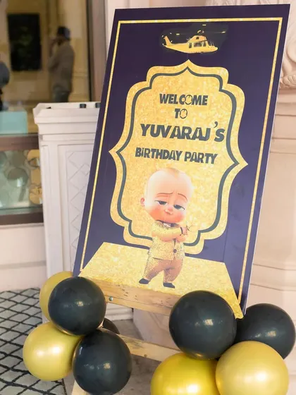 A stylish welcome board for a Boss Baby theme, designed with a black and gold glitter effect. It sets a sophisticated tone for the party right from the entrance.