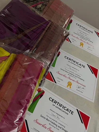 A proud moment, awarding certificates to my students. Their beautifully folded sarees are a testament to their hard work during the workshop.