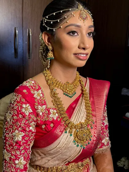 Another angle of Chaitra's beautiful muhurtham look. The makeup is subtle yet elegant, ensuring she looks and feels her best.