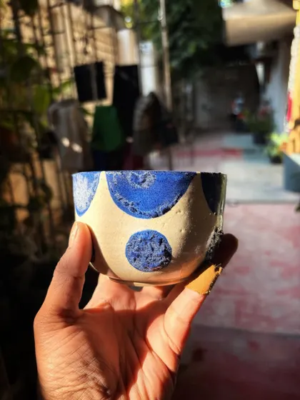 This student completed both her beginner and advanced courses with us. For her advanced work, she found her rhythm with the Nerikomi technique, creating this beautiful and calm set of patterned plates and bowls.