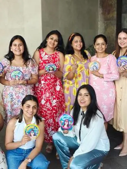 Another great shot of the team with their custom painted mini plates. These make for wonderful corporate gifts or mementos from a team event.
