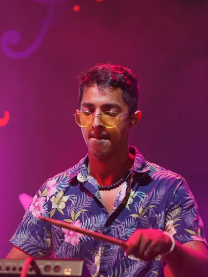 Our percussionist, keeping the rhythm tight and adding that extra flavor to our sound at The Night Market.