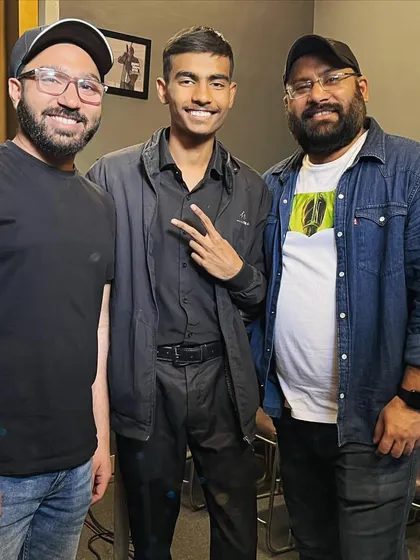 Another student with the instructors. We are proud to build a community where students feel comfortable approaching us for advice and guidance.