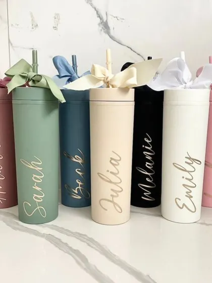 These tall, skinny tumblers are perfect for bridesmaids' gifts or personal use. They come in a variety of matte pastel colors and can be personalized with a name in an elegant script.