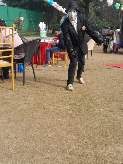 The Charlie Chaplin character strikes a classic pose, providing unique and nostalgic entertainment for both kids and adults.