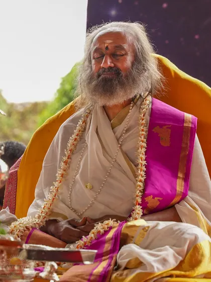 A moment of stillness during a morning Rudra Puja. These ceremonies are not just for watching; they are for experiencing, allowing the chants to wash over you and lead you into meditation.