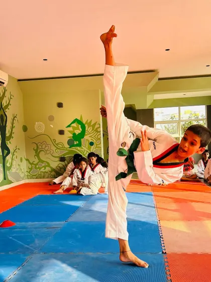 The determination on this student's face as he executes a high kick is what makes me a proud coach.