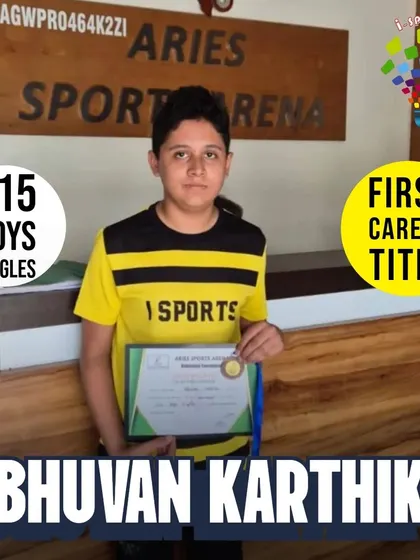A focused shot of Bhuvan Karthik with his certificate and medal, marking his first-ever career title in the U15 Boys Singles.
