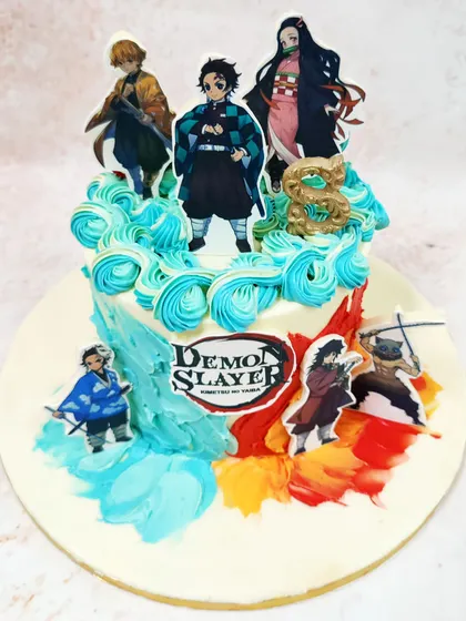 We capture the action of the popular anime with this Demon Slayer theme cake. Featuring key characters like Tanjiro and Nezuko set against a backdrop of abstract buttercream art, this cake brings the world of demon slaying to your celebration with artistic flair.