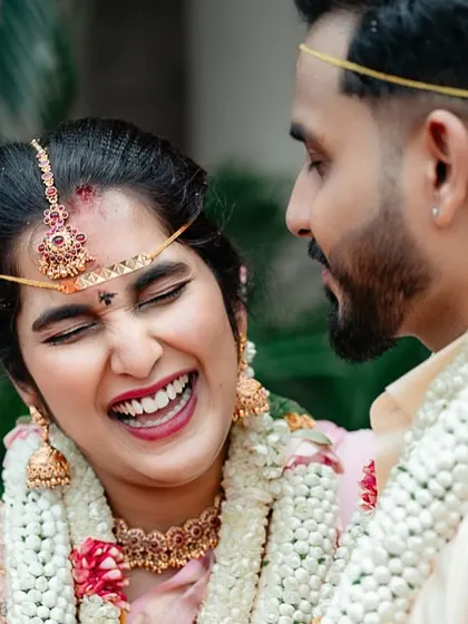 A moment of pure, unrestrained laughter from a bride. We love capturing these genuine expressions of happiness on the wedding day.