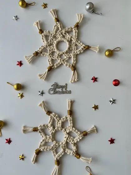 Intricate macrame snowflake ornaments, perfect for hanging on your Christmas tree or as part of your holiday decor.