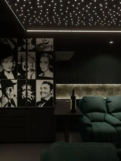 A close-up of the custom cabinetry and bar area in this green-themed lounge. It’s perfect for storing drinks and snacks for movie night.
