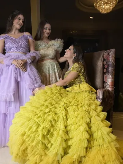Another shot of the vibrant ruffle gowns, perfect for creating a colorful and dramatic statement in your photos.