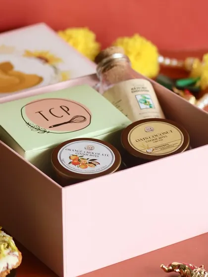 Another look at our Ganesh Chaturthi hamper, featuring a mini loaf cake, granola, and two types of our popular cookie bites.