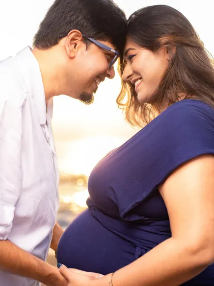 Forehead to forehead, sharing a happy and intimate moment. We focus on capturing the emotional connection that tells the story of your love.