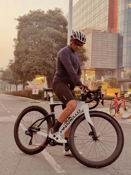 Getting ready to mount a Pinarello road bike for a ride.