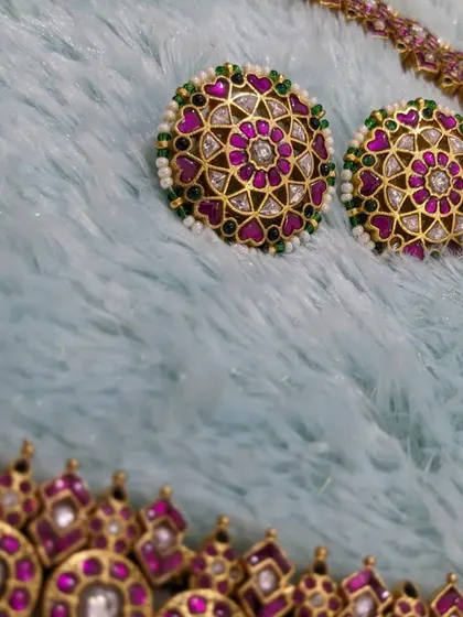 Another view of the beautiful Jadau stud earrings.