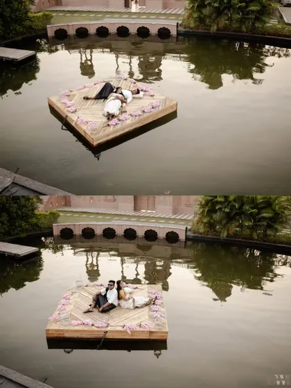 A unique aerial drone shot of the couple relaxing on a floating platform. This perspective adds a touch of grandeur and serenity to their South Indian themed pre-wedding shoot.
