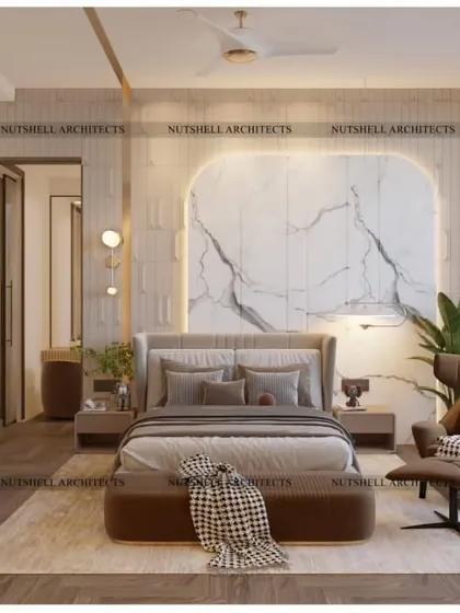 Opulence is key in this master bedroom, where a large slab of statuario marble creates a breathtaking feature behind the bed. The natural veining of the stone is a work of art in itself.