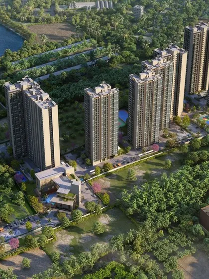 An aerial rendering of the Sattva Lumina project, illustrating how the development is nestled within a dense green buffer, providing residents with both urban connectivity and natural tranquility.