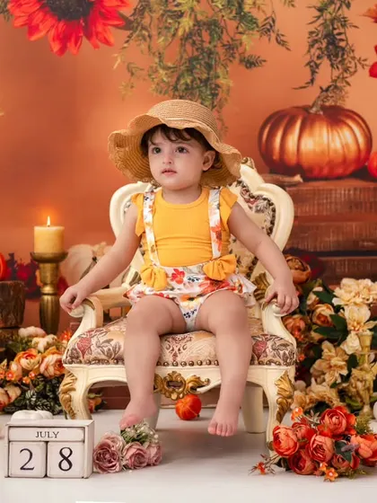 A little pumpkin in a straw hat. I have a variety of outfits and accessories to perfectly match any theme you choose.