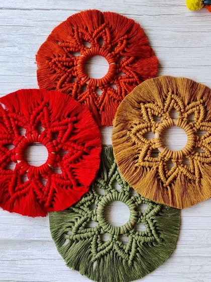 These macrame tea light holders are available in a range of festive colors to match your Diwali decor.