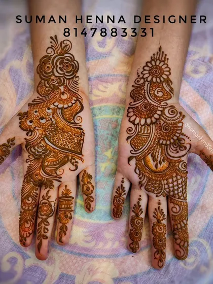 This Indo-Arabic design shows a beautiful blend of styles, with a large rose motif on one hand and a more traditional pattern on the other.