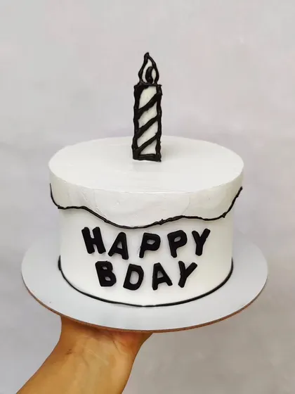A monochrome comic cake. The black and white design is really striking and modern, and it's made with zero fondant.