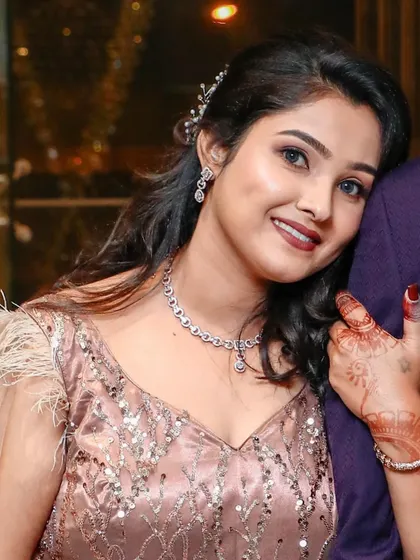 A lovely candid shot of Annie after her makeup session. This shows how the makeup looks soft and beautiful in professional photos, perfect for capturing memories.