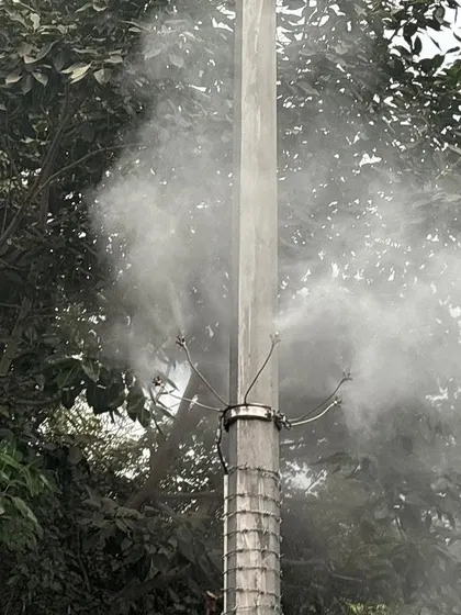 This is a close-up of the misting nozzle, the core of my air cleaning technology. These nozzles are mounted on existing electric poles, making installation quick and non-disruptive. They release a fine, targeted mist of treated water to improve local air quality.