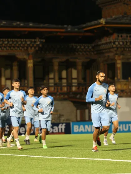 Leading the Indian U17 team on a run against the backdrop of the stadium in Bhutan. This image captures the discipline and hard work required at the elite level.