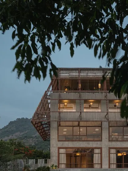 Set in the Nandi Hills, the design for The Estates Club reflects the raw, natural beauty of its surroundings, with a focus on materials and forms that complement the landscape.