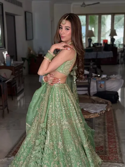 Another angle of this beautiful Anushree Reddy design. The soft, natural makeup allows the intricate outfit and the bride's beauty to take center stage.