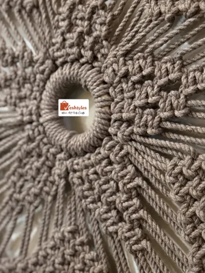 A close-up of the center of the mandala, showing the detailed knot work. I use high-quality cotton cord to create these intricate designs.