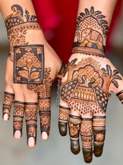 A beautiful design for the hands, featuring a lotus in a frame on one palm and a peacock on the other. The mix of floral and animal motifs creates a balanced and artistic look.