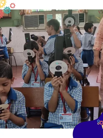 A group of young scientists uses their handmade spectroscopes, learning about light and optics in a fun, interactive way.