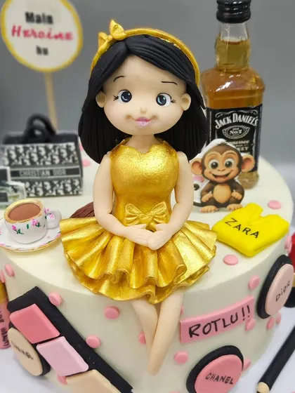 "Main Apni Favourite Hoon!" This cake is all about the birthday girl, featuring a custom figurine of her surrounded by all her favorite things: makeup, brands, and even a mini Jack Daniel's bottle.