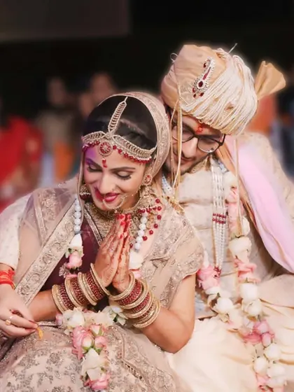 Capturing the beauty of a bride on her journey, with her groom by her side. A sweet, candid moment from their wedding ceremony.