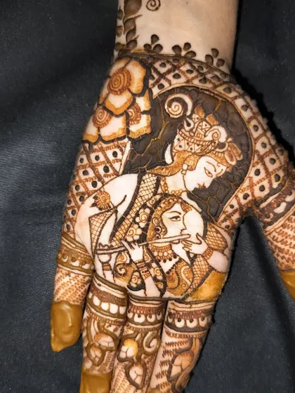 A beautiful Radha Krishna portrait, showing their divine connection. This style of figure work is something I specialize in for my brides.