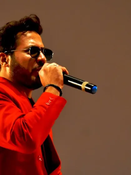In the zone, microphone in hand, addressing the audience in Patna. This is my office, and I love every minute of it.