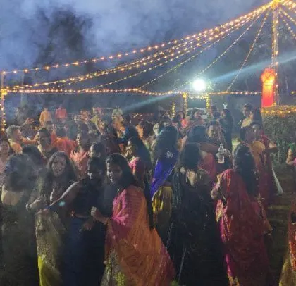 A community Diwali party with beautiful string light decorations.