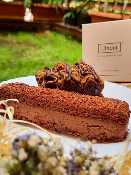 A duo of our chocolate pastries, showcasing the Dark Belgian Mousse and a rich brownie. This is a perfect selection for the true chocolate aficionado.