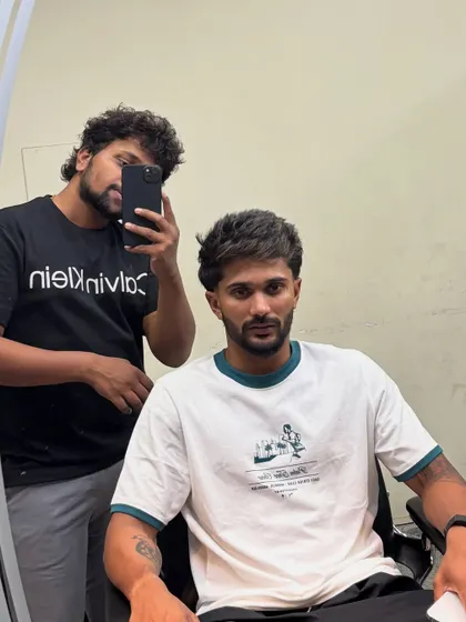 A close-up of Nitish Kumar Reddy's textured hair.