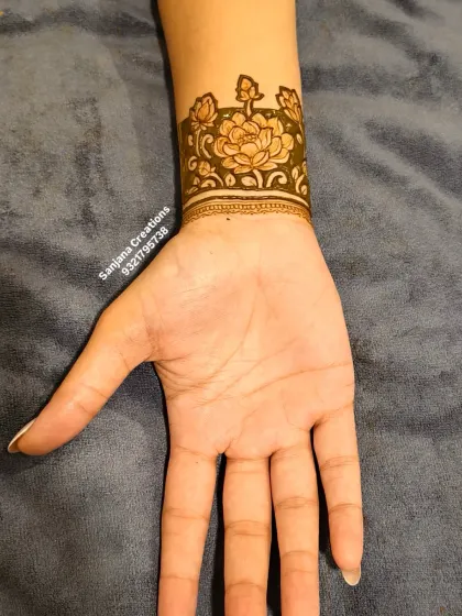 A beautiful lotus cuff design, perfect for an engagement or party.