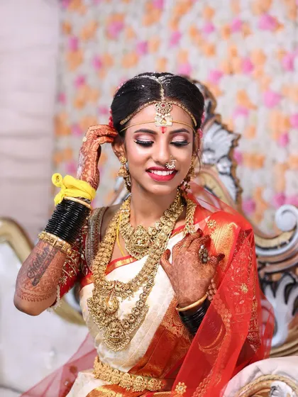 This is the same beautiful shot of my bride, highlighting the perfect harmony between her makeup, jewelry, and joyful expression.