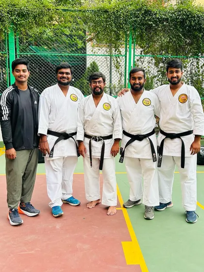 A group of my senior black belt students and instructors. Their journey is a testament to the principle that discipline leads to habits, consistency, and finally, growth.